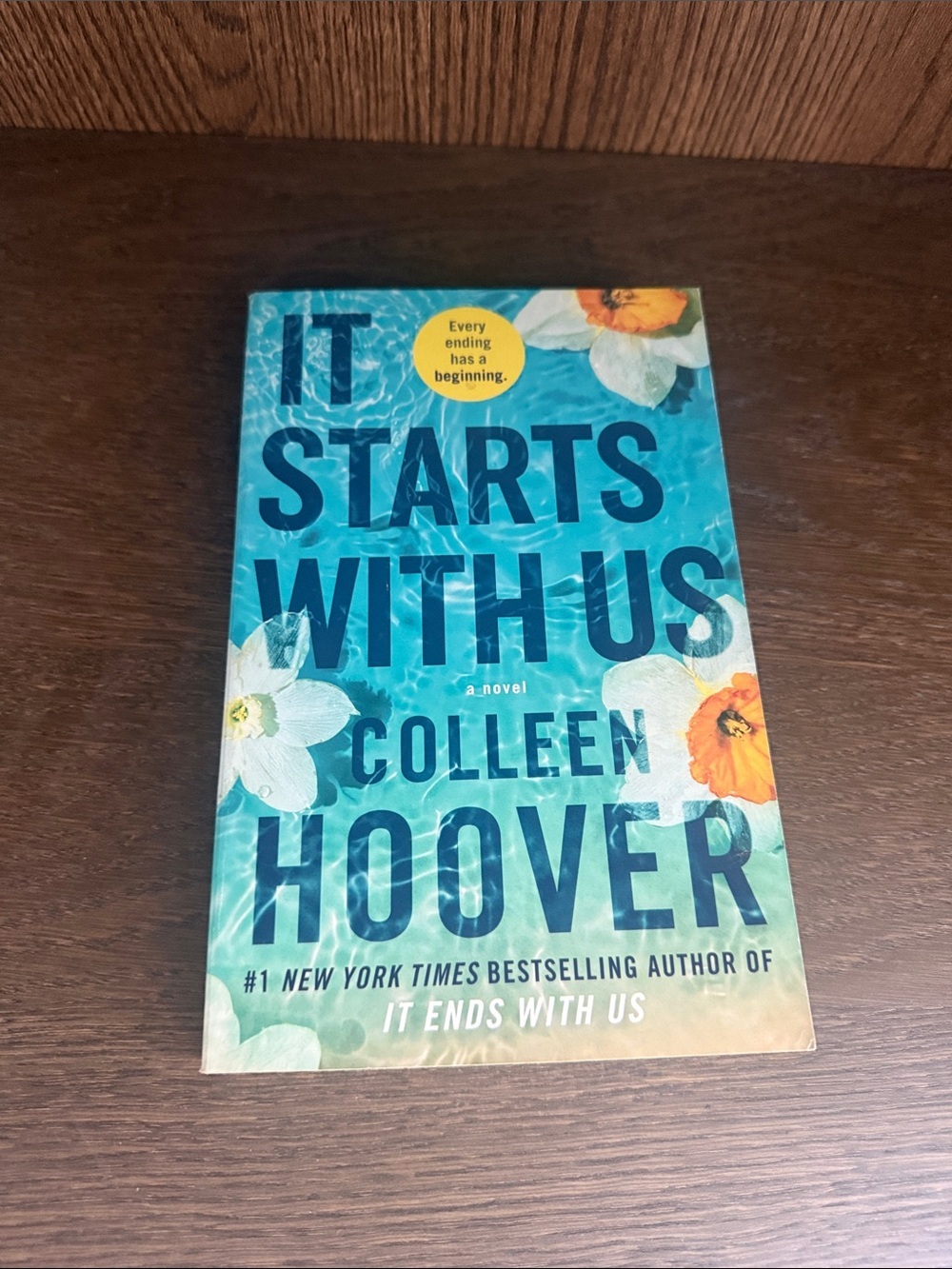 It Starts With Us by Colleen Hoover - Blue Floral Paperback